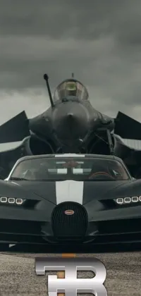 This phone live wallpaper features a stylish Bugatti car parked in front of a fighter jet against a dark, industrial backdrop
