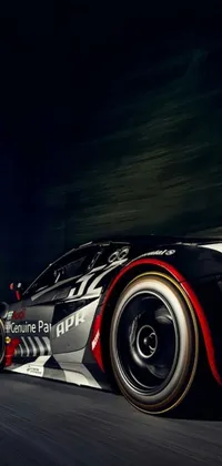 This phone live wallpaper depicts a racing car close-up on a race track, with digital art elements and a Tumblr-inspired style
