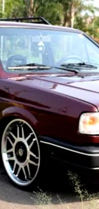 This maroon car live wallpaper for phones is a sophisticated and elegant addition to any device