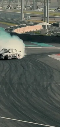 This phone live wallpaper features an action-packed scene showcasing a smoking car in motion against Dubai's stunning skyline, captured in a VHS-style quality