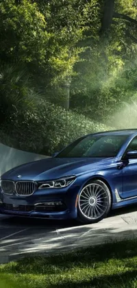 This phone live wallpaper features a sleek blue BMW sedan parked on the side of a road, basking in soft rim light and S-line design