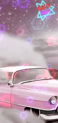 This live wallpaper features a stunning image of a vintage pink car driving through a vast desert with pyramids peeking out against the horizon