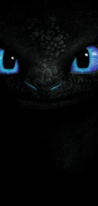 This live phone wallpaper features a stunning close-up of a toothless dragon's eyes set against a black background