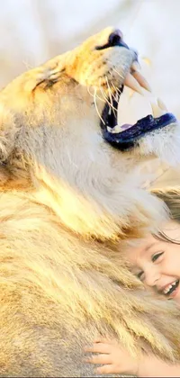 This live wallpaper depicts an adorable moment between a little girl and a lion in beautiful surroundings