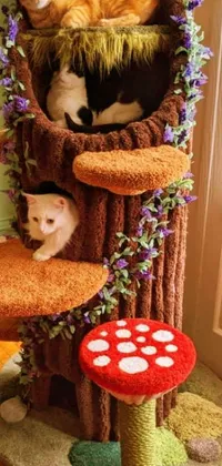 This delightful phone live wallpaper features a charming group of felines relaxing on a cat tree furnished with fairy furniture