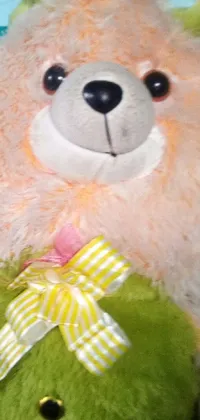 Bring a cozy and cheerful ambience to your phone's screen with this teddy bear live wallpaper