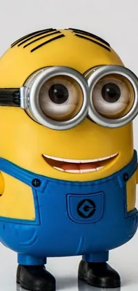 This fun and playful phone live wallpaper features a close-up of a life-size minion toy figure with impressive detail