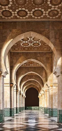 Enjoy a stunning live wallpaper of a magnificent hallway in a grand building featuring beautiful arched pillars and arabesque designs
