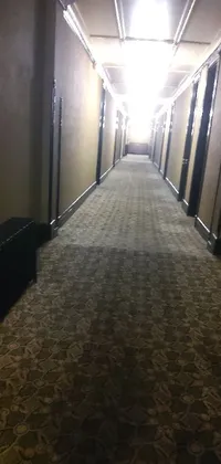 This live wallpaper for your phone features a long hallway, complete with an ominous suitcase on the floor