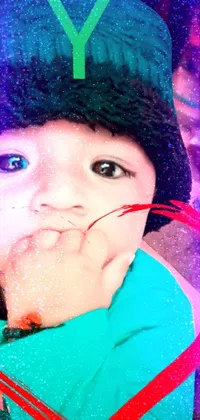 This phone live wallpaper displays a close up of a child wearing a colorful hat in a distinctive style