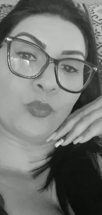 This black and white phone live wallpaper showcases a beautiful image of a woman with glasses, inspired by tachisme, featuring luscious lips and elegant features