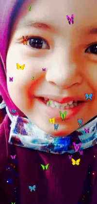 This live wallpaper showcases a child wearing a colorful headscarf in a close-up shot