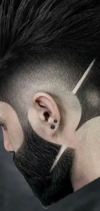 This edgy live phone wallpaper features a man with scissors in his hair, adorned with a stipple effect and long spikes