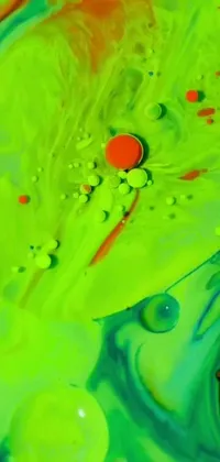 This live wallpaper features a vibrant close-up of a swimming fish in a body of water