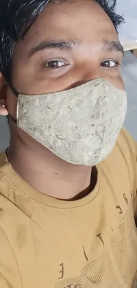 Get a phone live wallpaper featuring a close-up of a person wearing a face mask
