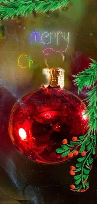 Get into the holiday spirit with this stunning phone live wallpaper featuring a red ornament hanging from a beautifully decorated Christmas tree