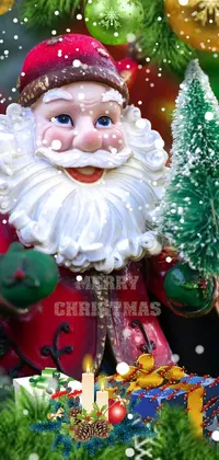 This festive phone live wallpaper showcases a charming figurine of Santa Claus holding a beautifully decorated Christmas tree