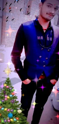 This phone live wallpaper showcases a man standing beside a colorfully decorated Christmas tree