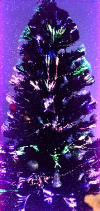 Enhance your phone's festive mood with this mesmerizing live wallpaper featuring a hologram of an enchanting Christmas tree