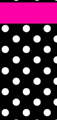 This sleek phone live wallpaper features a black and white polka dot pattern with a trendy pink stripe, set against a modern flat black background