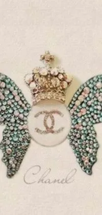 This live wallpaper features a darling design of a brooch with a crown against a dark background