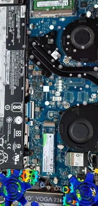 This phone live wallpaper showcases a detailed close-up of a laptop motherboard