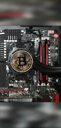 This live wallpaper features a computer motherboard with a bitcoin on it, perfect for IT specialists and Bitcoin enthusiasts
