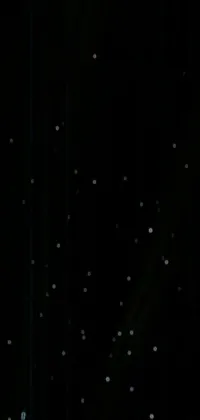 This phone live wallpaper depicts a man snowboarding against a backdrop of stars on a black background