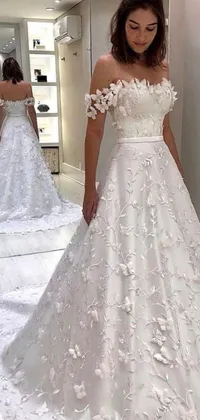 This live wallpaper showcases a detailed drawing of a woman in a wedding dress standing in front of a mirror, with a soft, dreamlike quality that creates a mesmerizing and enchanting effect