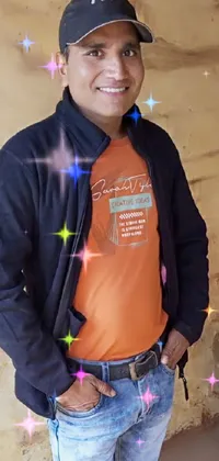 This phone live wallpaper features a man standing confidently, wearing an orange t-shirt and casual clothing