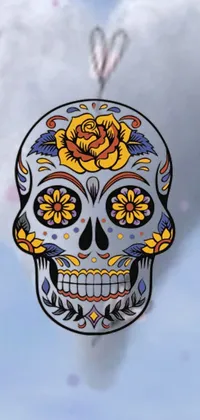 This live wallpaper showcases a vibrant sugar skull ornament with a stunning rose on it