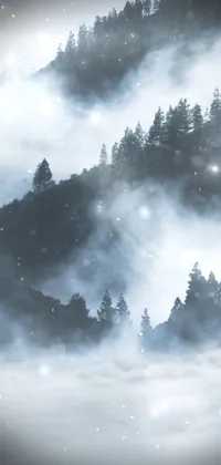 Explore the stunning beauty of nature with this phone live wallpaper featuring a deer standing atop a snow-covered slope
