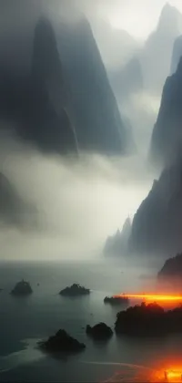 This stunning phone live wallpaper showcases a beautiful natural landscape featuring the scenic sight of a large body of water surrounded by mountains