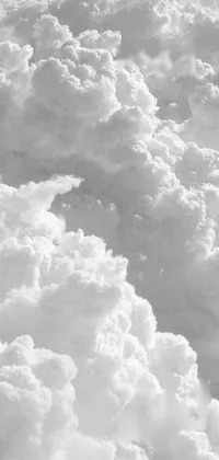 This black and white phone live wallpaper features a stunning photo of clouds as seen from an airplane