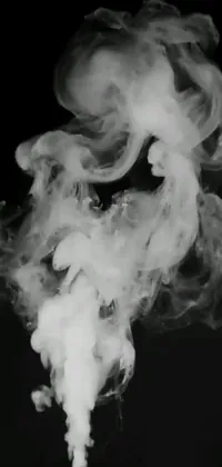 This captivating phone live wallpaper features a monochromatic image of smoke that appears to be floating in the atmosphere