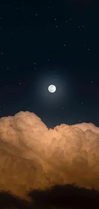 This stunning live wallpaper for your phone features a peaceful image of a cloud with a full moon in the sky against a picturesque background