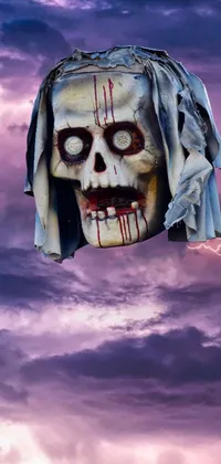 This live wallpaper is a striking image of a skull in the sky, with an eerie scene of an evil nun and horror animatronic that brings a touch of horror to your phone's home screen