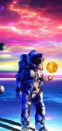 This phone live wallpaper features a digital rendering of a man wearing a space suit and holding a ball