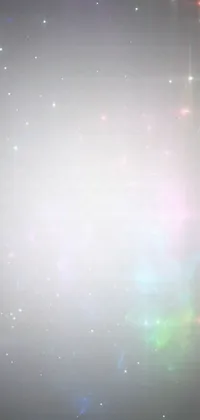 This smartphone live wallpaper features a stunning hologram light shining on a black background, with an ethereal lighting effect and a celestial sparkles sky