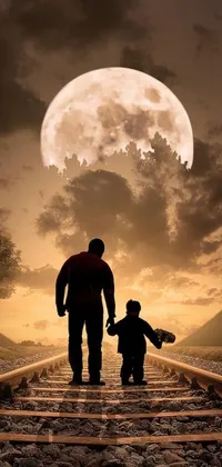 This phone live wallpaper features a stunning photograph of a man and child standing on a train track at sunset