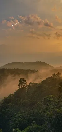 This stunning live wallpaper features a beautiful mountain sunset scene