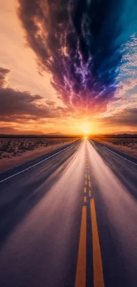 This phone live wallpaper depicts a scenic view of a long desert road at sunset, with vibrant colors and heavenly ambiance