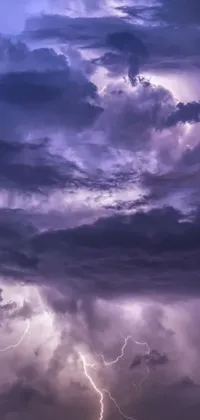 Experience the power of nature with this stunning phone live wallpaper featuring a large cloud filled with lightning flashes