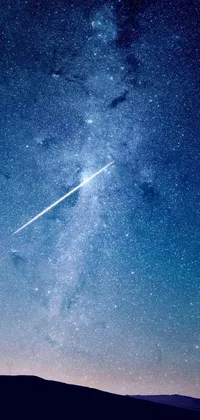 This stunning live wallpaper depicts a plane flying in the sky with a mesmerizing backdrop of space art
