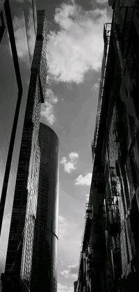 This mobile live wallpaper showcases a captivating black and white photograph of a city street adorned with towering skyscrapers in Chippendale, Sydney
