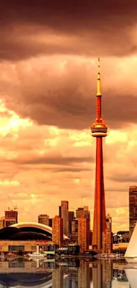 Immerse yourself in the city of Toronto with this stunning live wallpaper featuring a magnificent tower overlooking calm waters