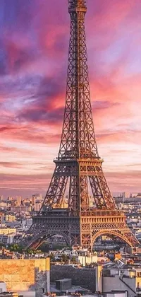 This phone live wallpaper depicts a window view facing the Eiffel Tower during a stunning sunset