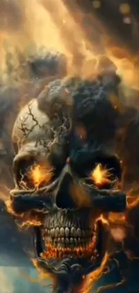 This phone live wallpaper features a realistic skull painting with flames emanating from its eye sockets and mouth