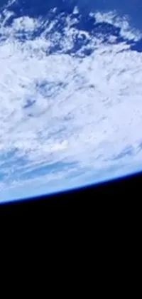 This phone live wallpaper showcases a stunning view of the beautiful Earth from the International Space Station