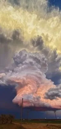 This live phone wallpaper depicts a massive cloud hovering over a dusty road
